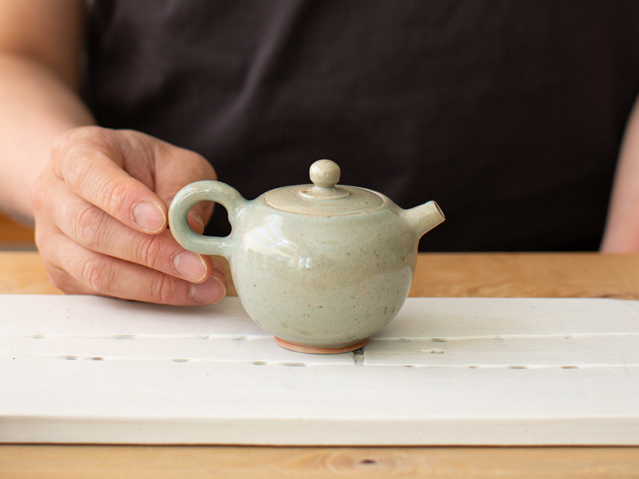 Globe celadon teapot. Zhang Yun Cheng.