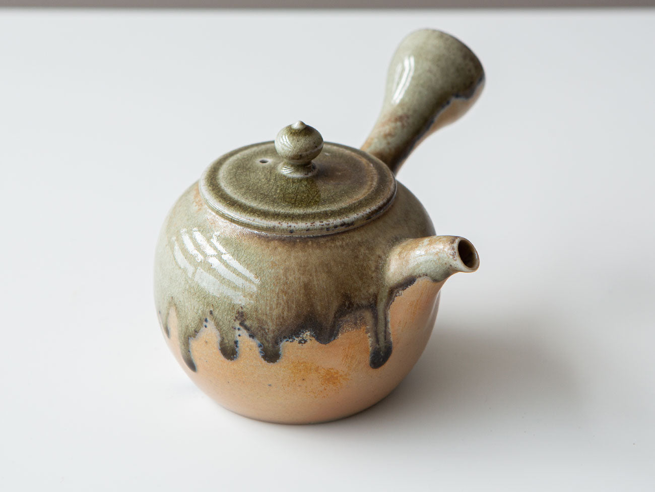 Ink + Gold. Top angled view. More lid and finial details.