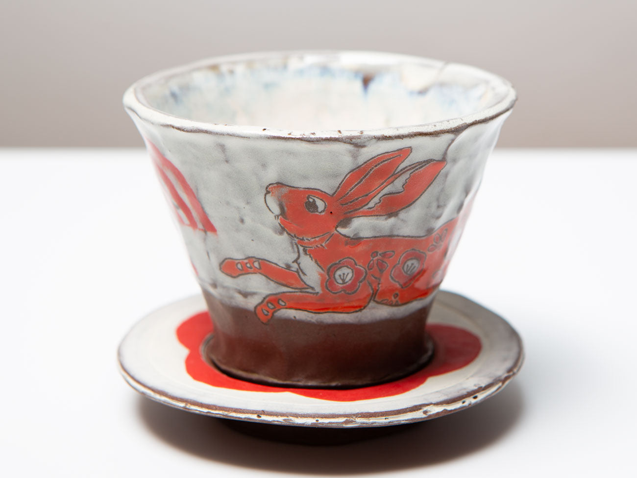 Rabbit Cup & Saucer by Lane Chapman.