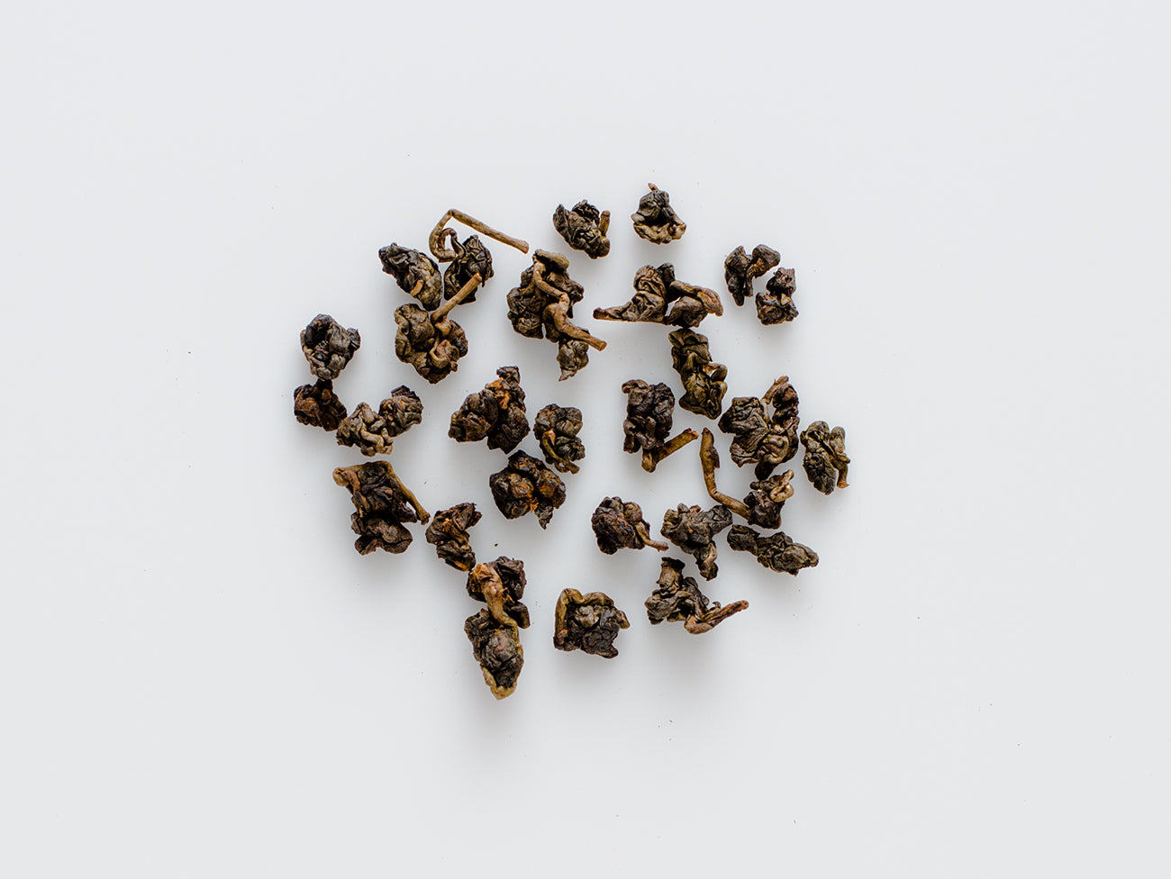Red water Tieguanyin, rolled leaves.