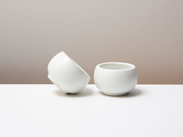 New Song Cups, in eggshell white.