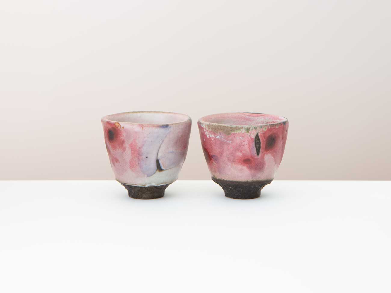 A Pair of Blush Cups. Wood-fired. Shino and Cobalt.