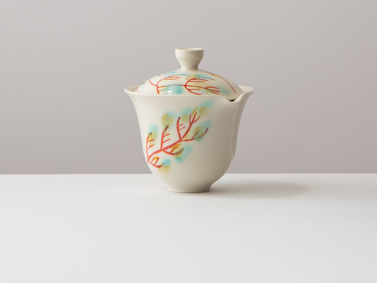 Hand-painted porcelain shiboridashi by Erin Louis Clancy.