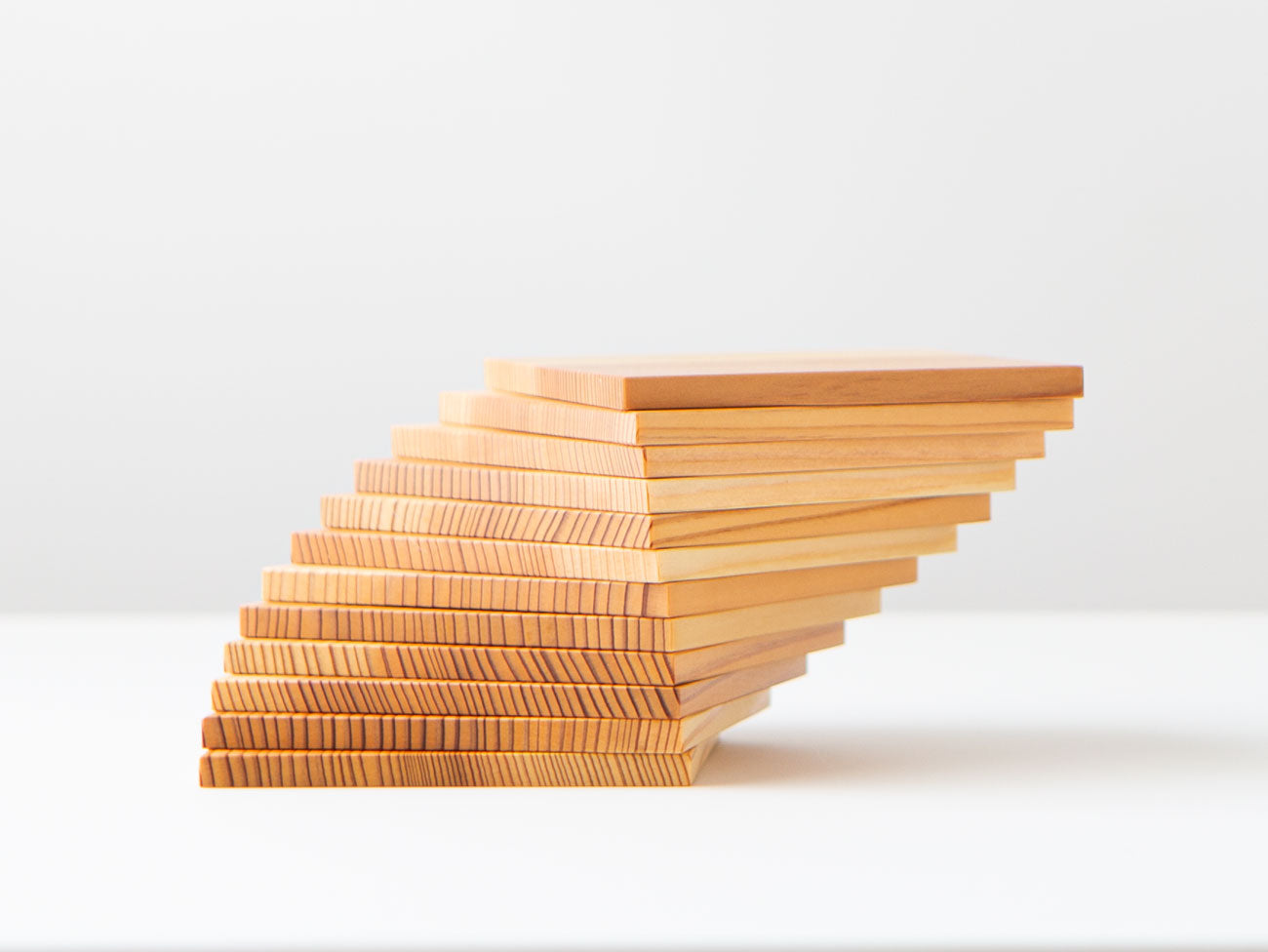 A stack of cedar coasters.