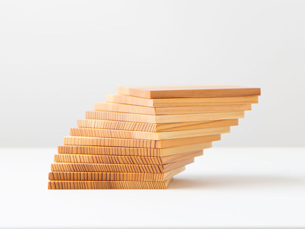 A stack of cedar coasters.