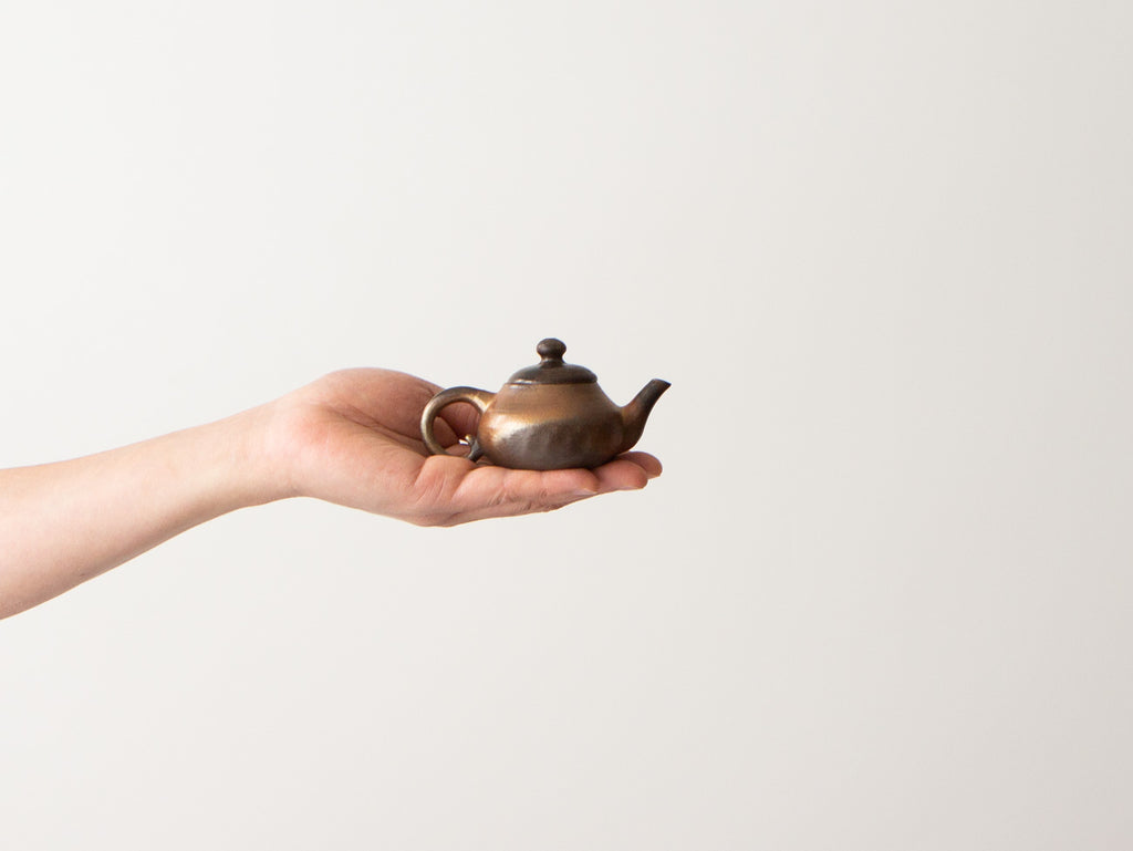 Bronze tea outlet kettle